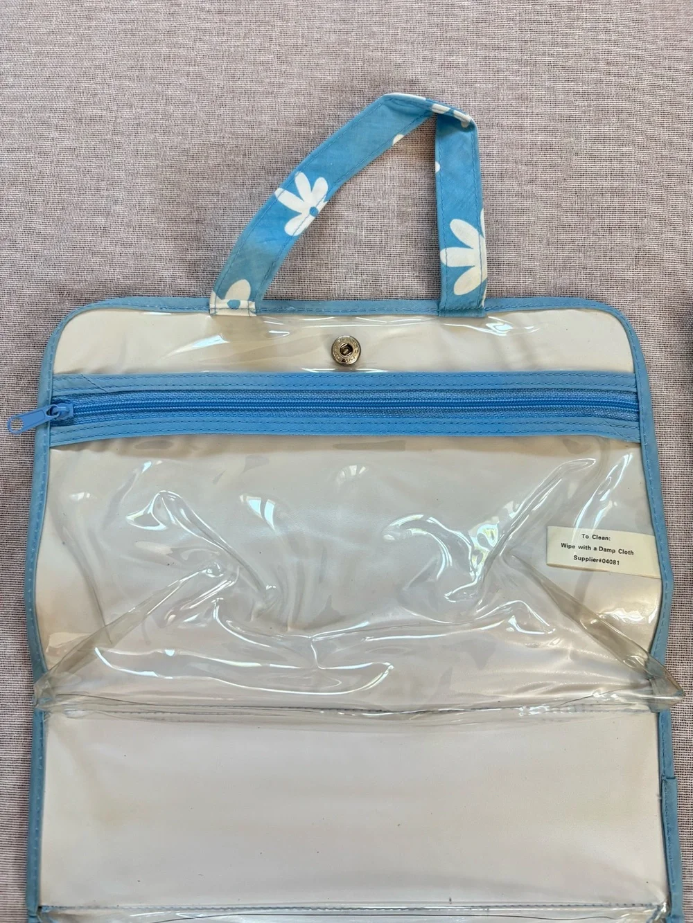 Vintage blue daisy boho vinyl clutch pouch.